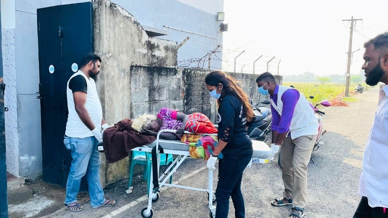 A rescued elder receiving a medical check-up and treatment at a KUT centre