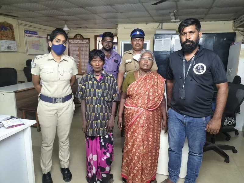 A rescued elder reunited with family members after tracing by the KUT team
